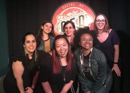 Photo of a group of women comedians smiling
