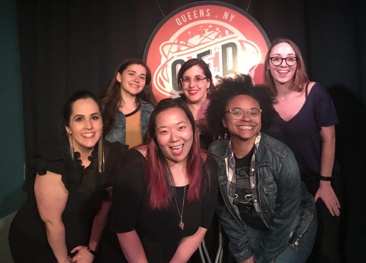 Photo of a group of women comedians smiling